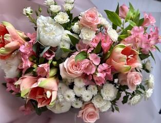 Wedding bouquet of different flowers, pinl, lilac, white roses. Wedding arrengement. Preparation of wedding ceremony 