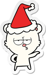bored polar bear hand drawn sticker cartoon of a wearing santa hat