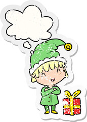 cartoon happy christmas elf with thought bubble as a distressed worn sticker