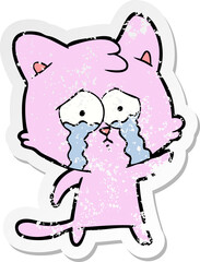 distressed sticker of a crying cartoon cat