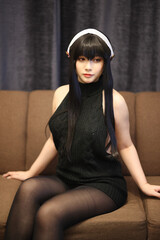 Portrait of a beautiful young woman Cosplay with black sweater