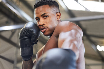 African man, boxing and punch in portrait for fitness, focus or training at gym for growth, goal...