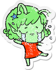 distressed sticker of a cartoon crying alien girl
