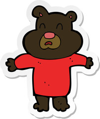 Obraz premium sticker of a cartoon unhappy black bear