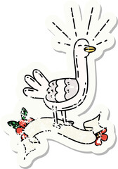 worn old sticker of a tattoo style sea bird