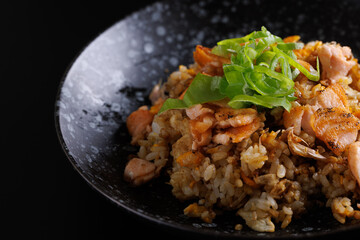 Japanese fried rice yakimeshi isolated in black background