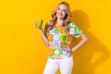 Photo of charming business lady hold green tea cup start working day wear trend shirt pants isolated yellow color background