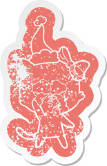 quirky cartoon distressed sticker of a cat wearing santa hat