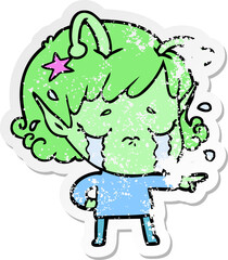 distressed sticker of a cartoon crying alien girl