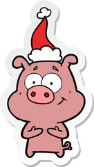 happy hand drawn sticker cartoon of a pig wearing santa hat