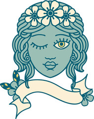 traditional tattoo with banner of a maidens face winking