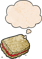 cartoon biscuit with thought bubble in grunge texture style