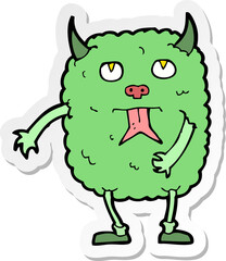 sticker of a funny cartoon monster