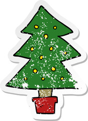 distressed sticker of a cartoon christmas tree