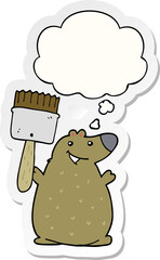cartoon bear with paint brush with thought bubble as a printed sticker