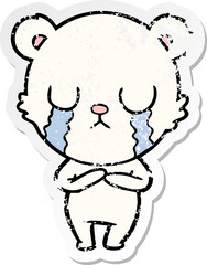 distressed sticker of a crying polar bear cartoon