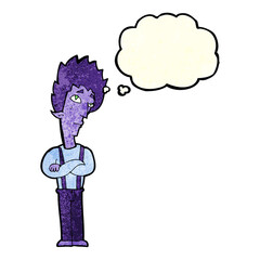 cartoon vampire with thought bubble