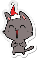 happy hand drawn sticker cartoon of a cat wearing santa hat