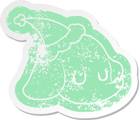 quirky cartoon distressed sticker of a elephant face wearing santa hat