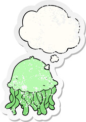 cartoon jellyfish with thought bubble as a distressed worn sticker
