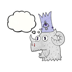 freehand drawn thought bubble textured cartoon ram head with magical crown