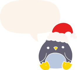 cute cartoon penguin wearing christmas hat with speech bubble in retro style