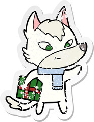 distressed sticker of a friendly cartoon christmas wolf