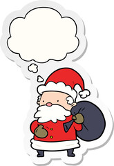 cartoon santa claus with thought bubble as a printed sticker
