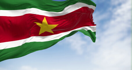 Suriname national flag waving in the wind on a clear day