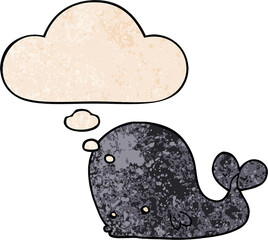 cartoon whale with thought bubble in grunge texture style