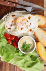 Breakfast: Crispy Toast and Hard-Cooked Eggs Tomato greens, salad dressing