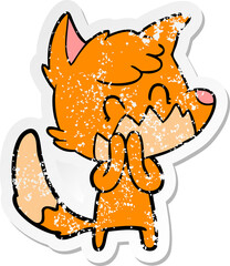 distressed sticker of a cartoon friendly fox