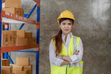 Asian businesswoman using laptop computer checking customer orders online at home. Starting a small business SME. independent entrepreneur Online business, parcel delivery concept