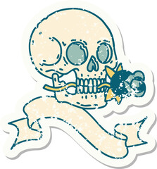 worn old sticker with banner of a skull and rose