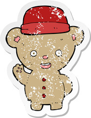 retro distressed sticker of a cartoon bear in hat