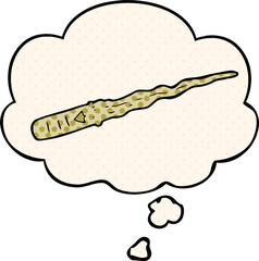 cartoon magic wand with thought bubble in comic book style