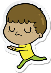 sticker of a cartoon grumpy boy