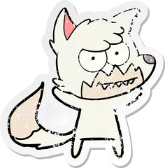 distressed sticker of a cartoon grinning fox