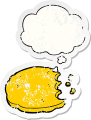cartoon cookie with thought bubble as a distressed worn sticker