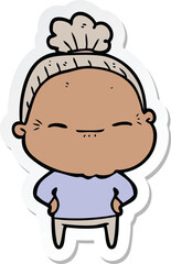 sticker of a cartoon peaceful old woman