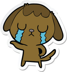 sticker of a cute cartoon dog crying