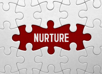 Fototapeta premium Word nurture on red puzzle background