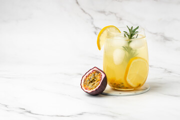 Lemonade or tropical cocktail with lemon, passion fruit, Tropical drink for summer party