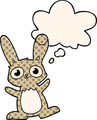 cute cartoon rabbit with thought bubble in comic book style