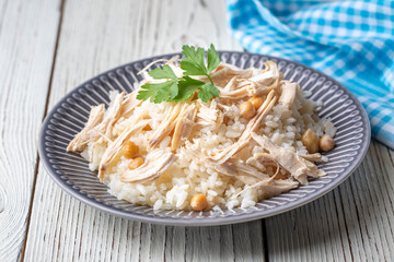 Traditional delicious Turkish food; Rice with chickpeas and chicken (Turkish name; Tavuklu nohutlu pilav or pilaf)