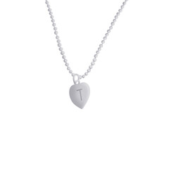 Fototapeta na wymiar heart shaped necklace with initial