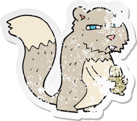 retro distressed sticker of a cartoon angry squirrel with nut
