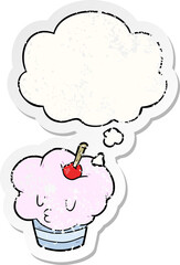 cartoon cupcake with thought bubble as a distressed worn sticker
