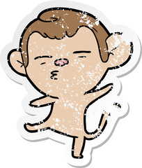 distressed sticker of a cartoon suspicious monkey