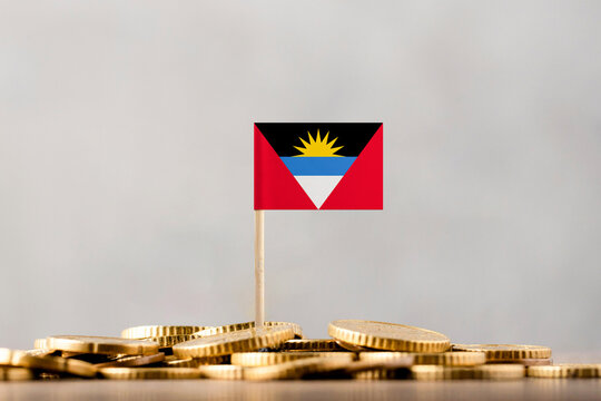 The Flag of Antigua and Barbuda with Coins.